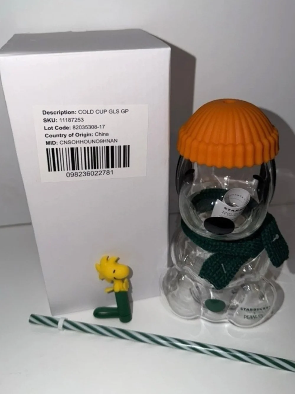 Starbucks Clear Glass Peanuts Snowman Cup with Orange Lid and Green Scarf